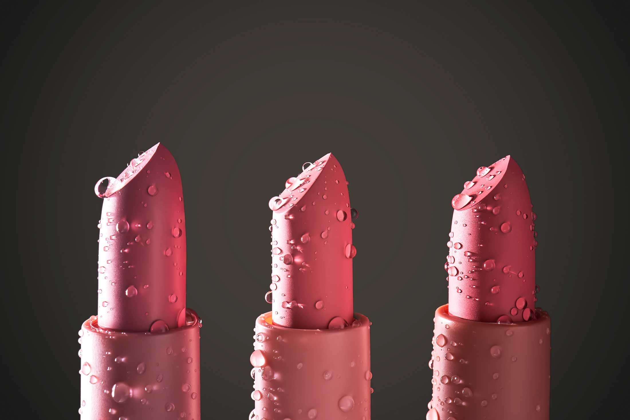 moisturizing lip stick balm concept sticks droplets of water