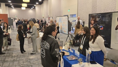 Attendees worked their way through a bustling room of tabletop exhibitors.