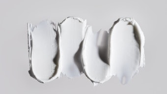 skin care white cream texture scoop