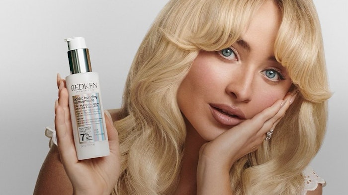 Sabrina Carpenter poses with Redken's new ABC 24/7 Night & Day Serum.
