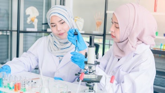 female Asian scientists chemistry lab research AdobeStock_317030500.jpg