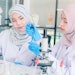 female Asian scientists chemistry lab research AdobeStock_317030500.jpg