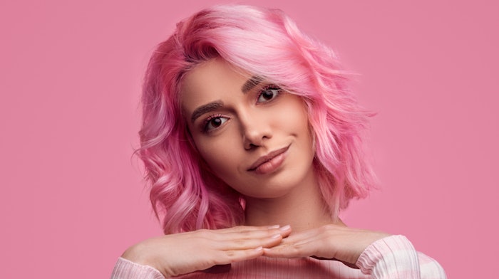 young woman pink pastel hair