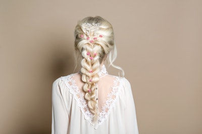 Mermaid braids echo the fantasy-inspired looks we’re seeing in pop culture. With creative braided patterns and accessories, this intricate hairstyle is gaining traction, particularly for special events and photoshoots.