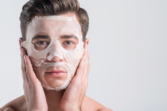 Male with a face mask on at the spa