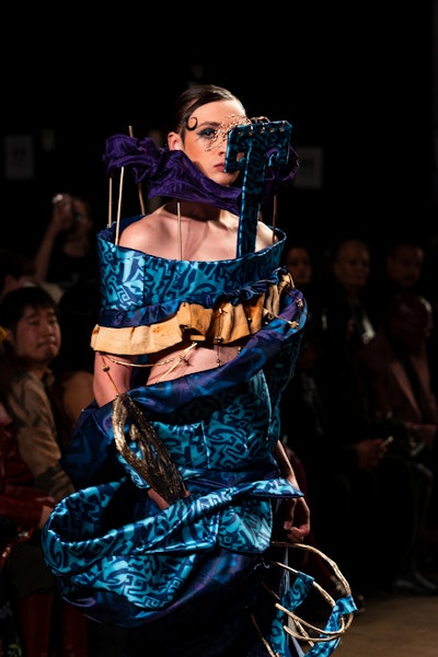 Model walking the runway at the Openstudio NYFW Show