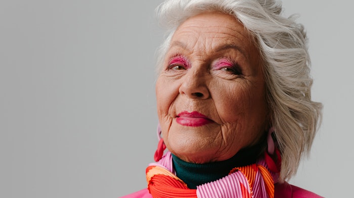 beautiful mature woman white hair makeup smirk