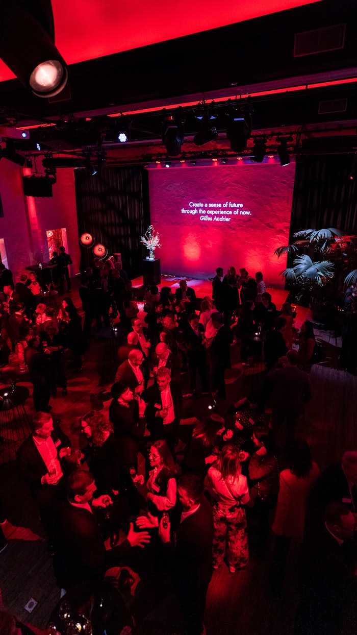 Guests explore the fusion of light, sound, and beauty science at the '[MoleculArt]' installation, created in collaboration with Nxt Museum and Lumus Instruments.