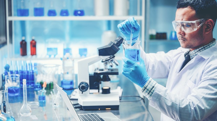 Chemist In Lab Formulating Mixing Adobe Stock 367876719