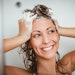 Woman Washing Hair In Shower Foamy Smiling Adobe Stock 192745176