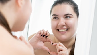 Woman Smiling In Mirror Happy Heart Fingers Adobe Stock 452483001