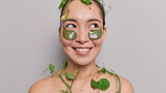 Woman Wearing Green Under Eye Patches Plants And Leaves Adobe Stock 448334173