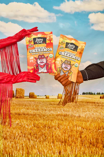 Cheezmos, organic cheese puffs, join LesserEvil’s portfolio and are available in Blazin’ Hot Cheddar and Cowboy Cheddar flavors.