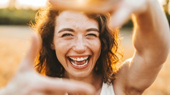 Happy Woman Smiling Laughing Framing Face With Fingers Outside Sunlight Backlit Adobe Stock 758768316