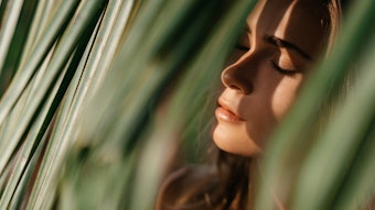 Natural Woman Beauty In Leaves Sun Shining Through Eyes Closed Adobe Stock 397528386