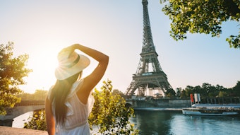 Tourist In Paris Eiffel Tower Sun
