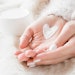 Two Hands Cream Heart Shaped Soft Clothing White Background Adobe Stock 187758243