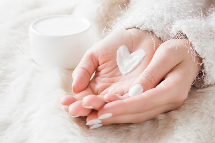 Two Hands Cream Heart Shaped Soft Clothing White Background Adobe Stock 187758243