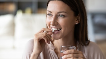 Woman Beauty Holistic Vitamin Pill Glass Of Water Adobe Stock 345241436