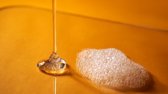 Clear Liquid And Foam On Orange Background I Stock 1448099587 Med (1)