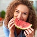 Woman Cute Curly Hair Eating Watermelon Nutricosmetic Concept Adobe Stock 288870058