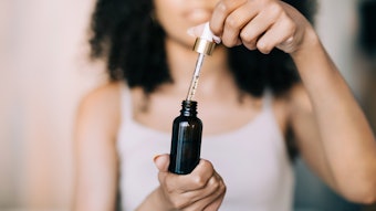 Woman Holding Amber Glass Bottle With Dropper Serum Concept Adobe Stock 516781372
