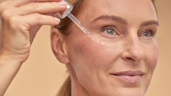 Mature Woman Using Skin Serum Adobe Stock 396008026