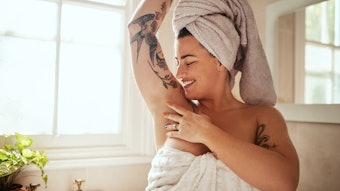Woman In Bathroom Arm Up Feeling Pit, Towel On Head Tattoo Arms Adobe Stock 601258921