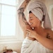 Woman In Bathroom Arm Up Feeling Pit, Towel On Head Tattoo Arms Adobe Stock 601258921
