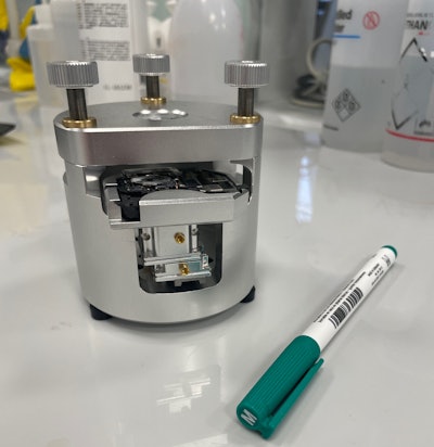 Loretta uses an enhanced, miniaturized and accelerated atomic force microscope to perform skin analysis.