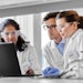 U Cinn Young Chemists At Computer In Lab Collaboration Adobe Stock 525719219