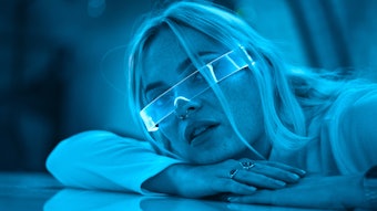 Woman Bathed In Blue Light Future G Adobe Stock 531268249