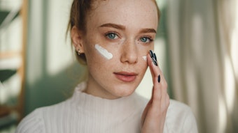 Young Woman Abti Aging Under Eye Cream Adobe Stock 647215792