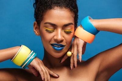 Gen Z and Millennials will rock mismatched manicures, two-toned lipstick and bright eyeshadow in two binary hues.