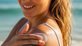 Womanapplyingsunscreen jpeg (1)