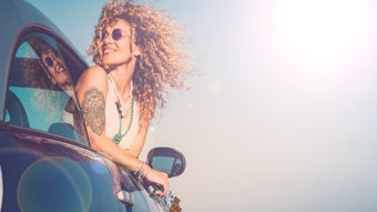 Woman Curly Hair Riding In Car Hanging Out Window Sunglasses And Sunlight Adobe Stock 366509764