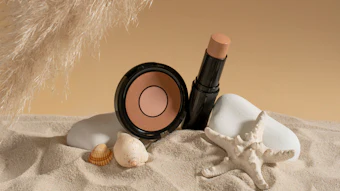 Color Cosmetics And Makeup In Sandy Beach Display Adobe Stock 516855615