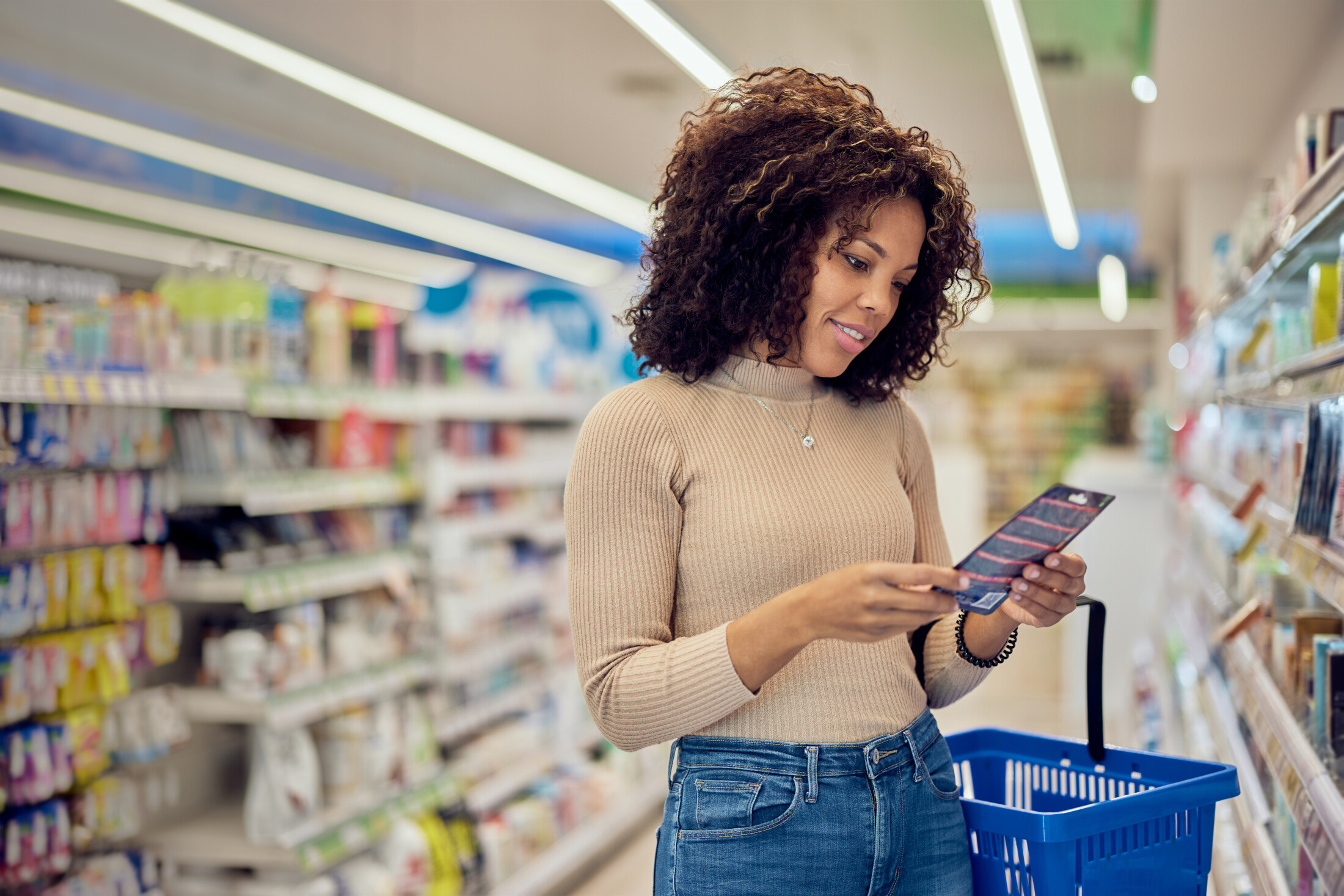 Woman Shopping At A Big Box Store For Hair Care And Skin Care Adobe Stock 600861224