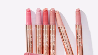 The Maracuja Juicy Lip Plumping Gloss includes maracuja, a superfruit complex and vitamin E.