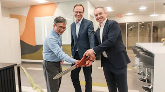 Solabia Executive Leadership Cutting Opening Ribbon