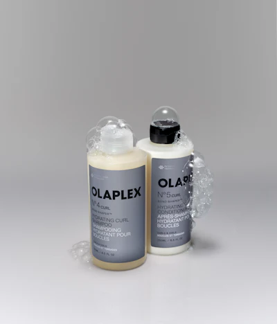 By embedding bond repair, hydration and definition into the shampoo-conditioner system itself, Olaplex is effectively repositioning wash-day from a maintenance step into a controlled performance stage in the styling process.
