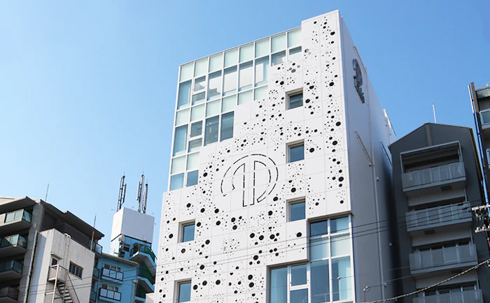 Taiki headquarter building in Osaka, Japan; the company's reorganization is intended to create a more integrated and scalable platform for international beauty brands while strengthening coordination between Asian and Western markets.
