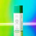 Drunk Elephant Protini Powerpeptide Resurfacing Serum bottle with teal and green cap against colorful gradient background