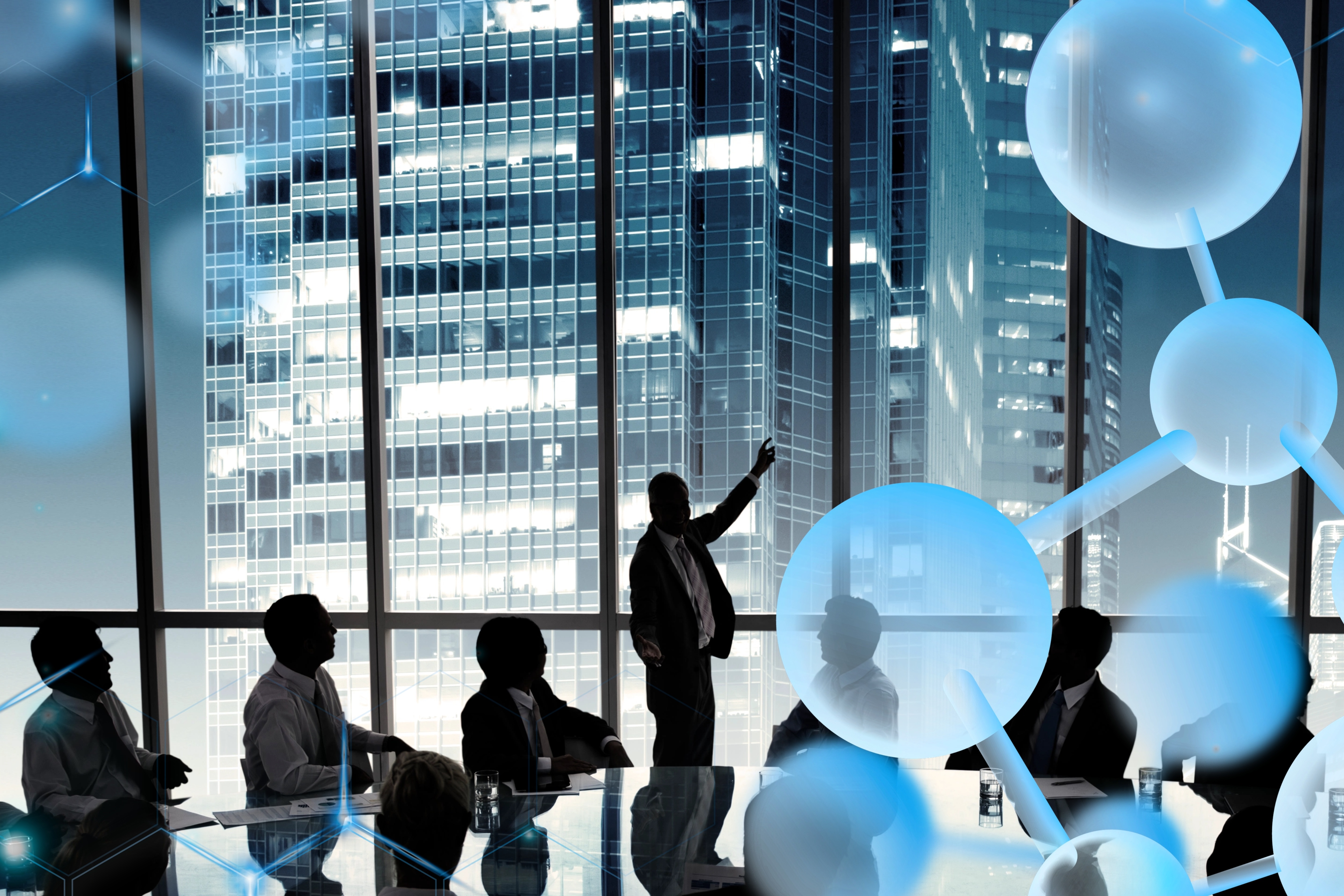 Business professionals in silhouette meeting in a modern office with city views and blue spherical design elements